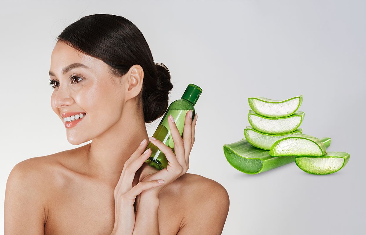 Woman holding aloe vera oil with perfect hair 