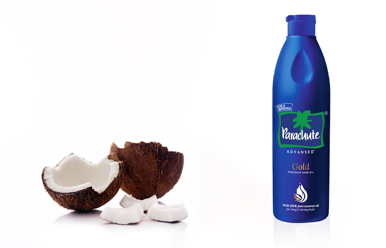 Broken coconuts and Parachute Advansed Gold Coconut Hair Oil